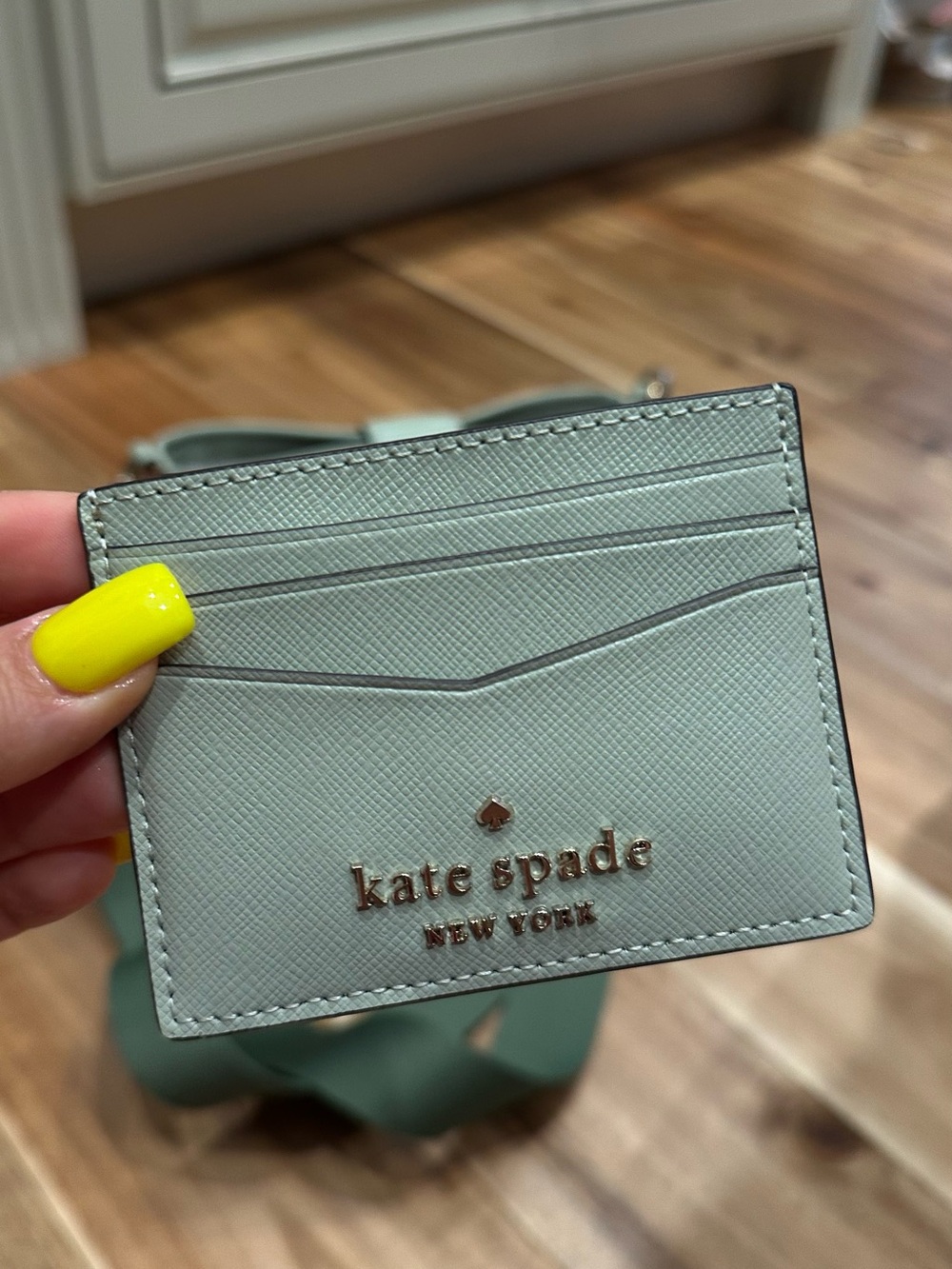 kate spade Mint Green Card Holder with Gold Logo